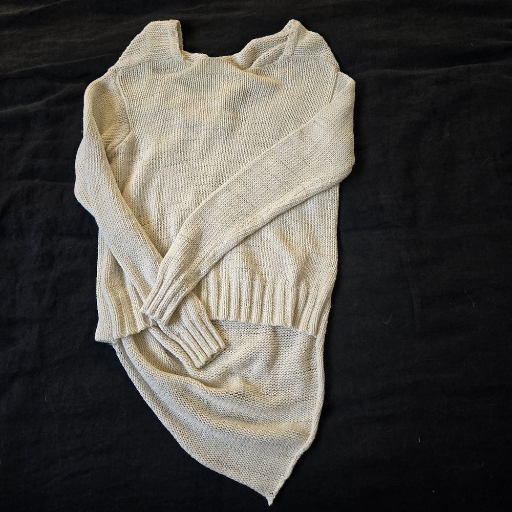Asymmetrical knit sweater. Rachel Zoe size small cream